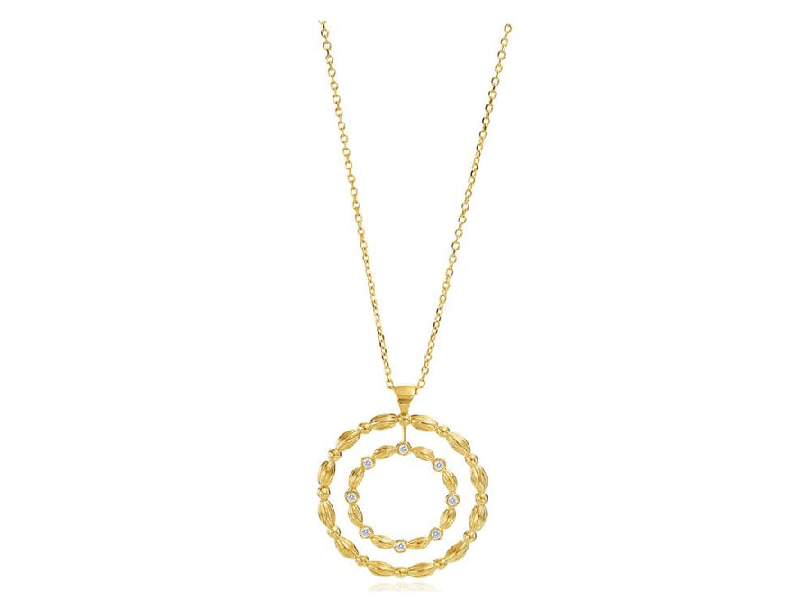 Gold and Diamond Nutmeg Pendant
